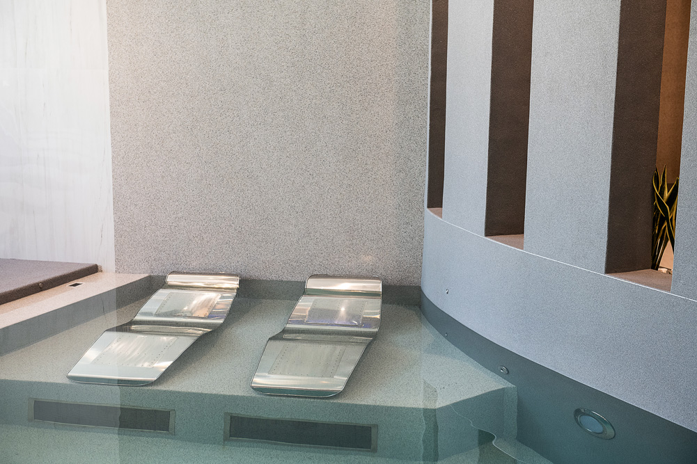 Indoor pool with lounge chairs